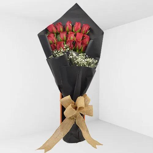 Dazzling Red Roses Bouquet Wrapped in Black Tissue