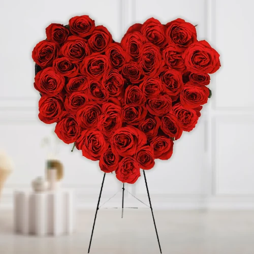 Book Heart Shaped Red Roses Arrangement with Cadbury Celebrations Pack