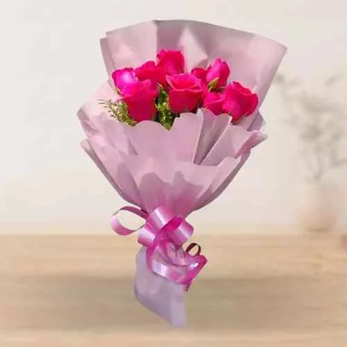 Captivating Bouquet of Pink Roses with Tissue Wrap
