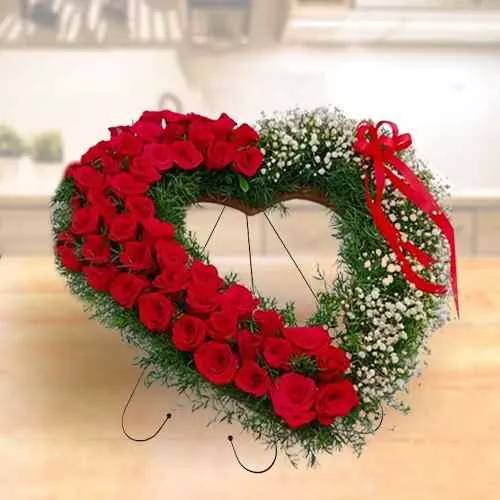 Stunning Heart Shaped Arrangement of Red Rose with white Baby Breath fillers