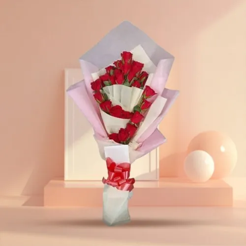 Order Tissue Wrapped Hand Bouquet of Red Roses