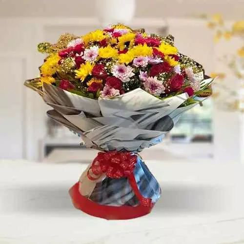 Send Classic Arrangement of Mixed Colorful Flowers with Designer Tissue