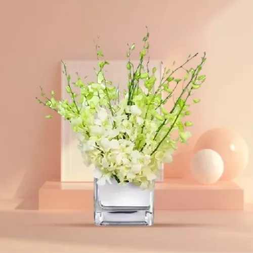 Impressive White Orchids Vase Arrangement