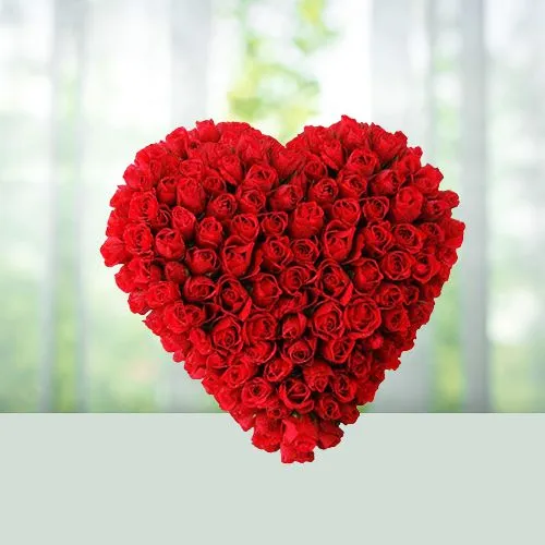 Designed Arrangement in Heart Shaped of 150 Dutch Roses in Red