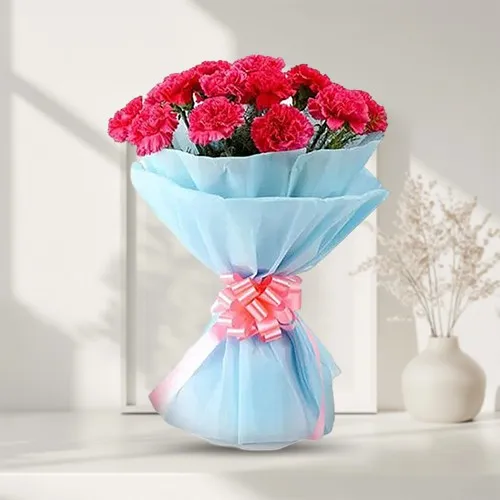 Send Cherished Bundle of Pink Carnations in Tissue Wrapping