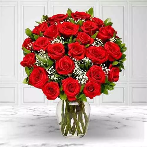 Fresh Red Roses in a Glass Vase