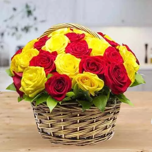 Vibrant Selection of Yellow and Red Coloured Roses in Basket
