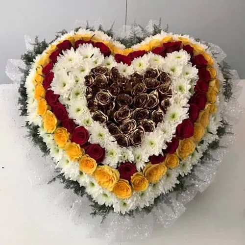 Deliver Heart Shaped Arrangement of Assorted Flowers