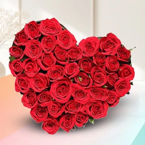 Exclusive Heart Shape Arrangement of 100 Red Roses