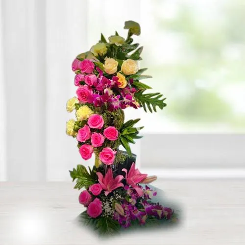 Send Eye Catching Assorted Flowers Standing Arrangement