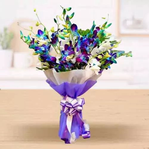 Elegant Bouquet of Blue n White Orchids with Tissue Wrapping	