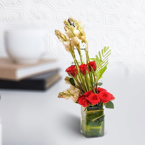 Beautiful Display of Red Roses N White Rajnigandha in a Glass Vase