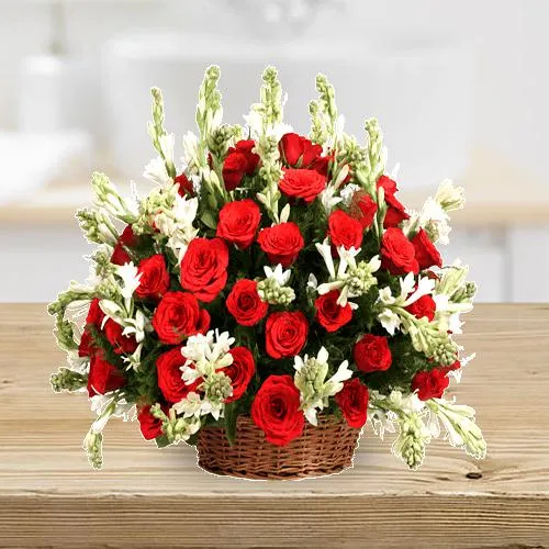 Shop for Red Roses n Rajanigandha in a Basket