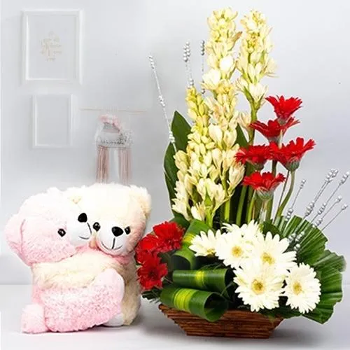 Striking Arrangement of Mixed Flowers with a Cute Teddy