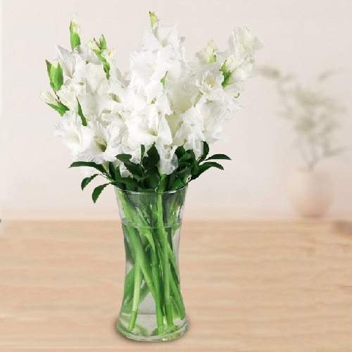 Breathtaking Display of White Gladiolus in a Glass Vase