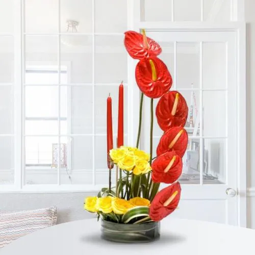 Send Arrangement of Anthurium n Roses with Candles