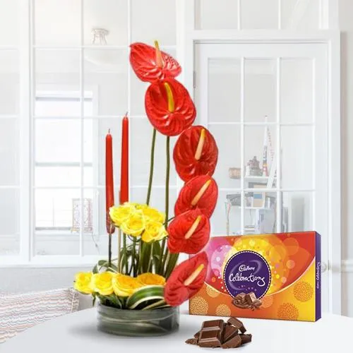 Alluring Flower Arrangement with Candles n Cadbury Celebration