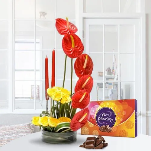 Shop Alluring Flower Arrangement with Candles n Cadbury Celebration