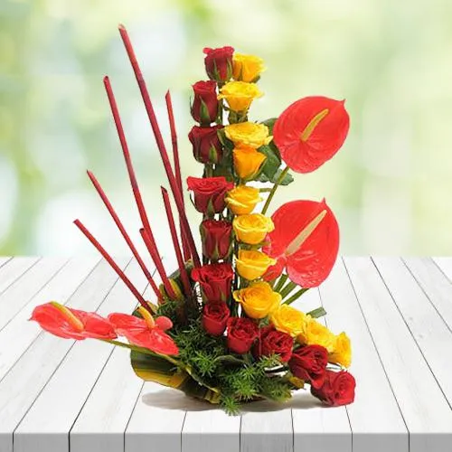 Deliver Red N Yellow Roses N Anthurium Arrangement