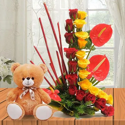 Exquisite Roses N Anthurium Arrangement with a Soft Teddy