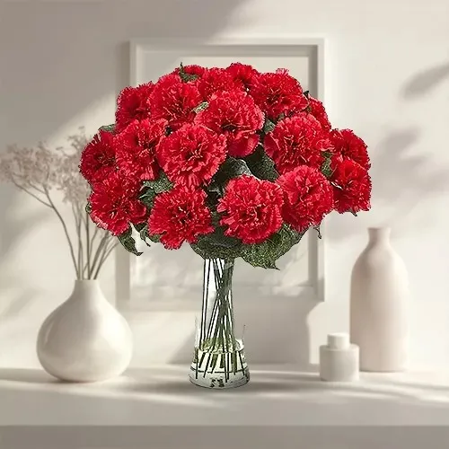 Red Carnations in Glass Vase