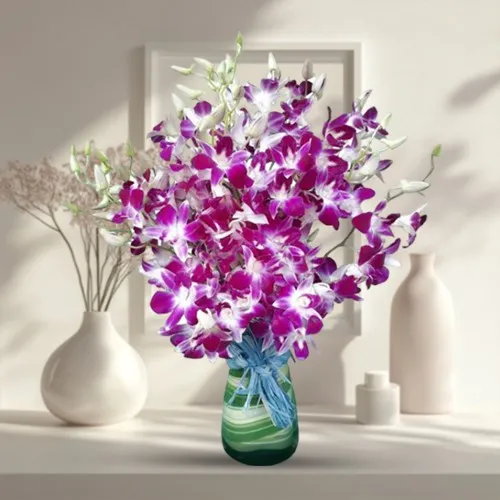 Glamorous Orchids in Glass Vase