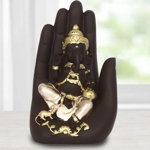 Impressive Handcrafted Palm Ganesha Showpiece