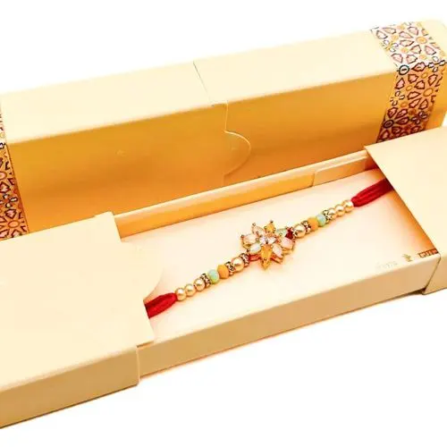 Ravishing Stone Crafted Rakhi in Box