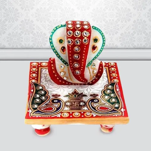 Propitious Marble Ganesh Chowki with Peacock Design