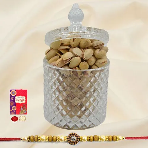 Salted Pistachios in a designer Glass Jar with a Rakhi