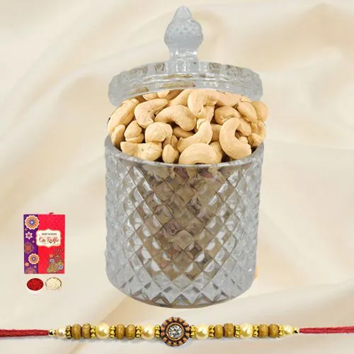 Crunchy Cashews in a designer Glass Jar with a Rakhi
