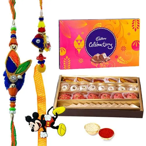 Lovely Gift of Well Prepared <font color=#FF0000>Haldiram</font>s Sweets and a Pack of Divine Cadbury Celebration