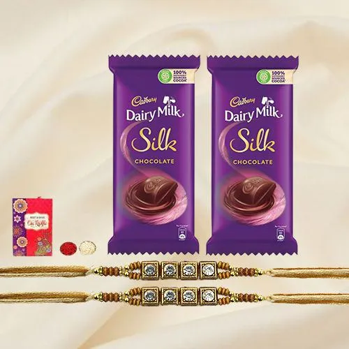 Attractive Combo of Dual Rudraksh Rakhis with Cadburys Dairy Milk Silk