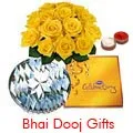 12 Yellow Roses with Cadbury Celebration and Kaju Katli