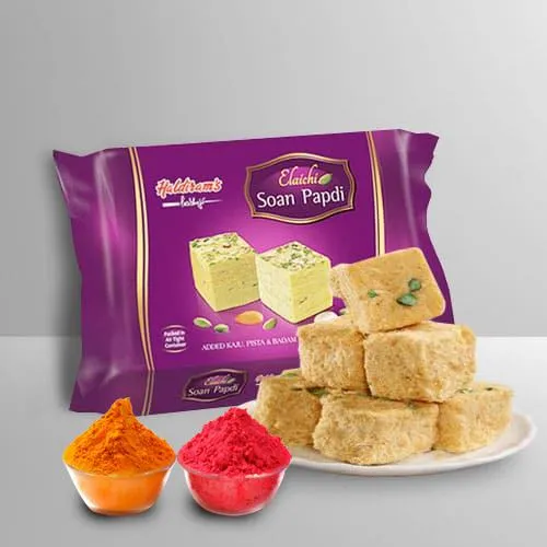Nicely Gift Wrapped Soan Papdi 500 Gms.  from Haldiram with free Gulal/Abir Pouch.