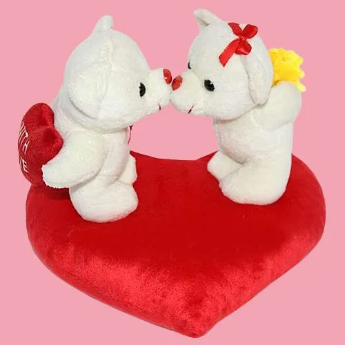 Deliver Kissing Couple Teddy on Heart Shaped Cushion