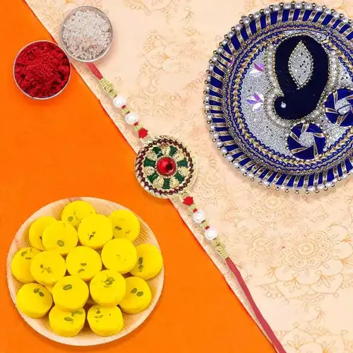 Free Rakhi with Delicious Kesar Pedas and Designer Pooja Thali