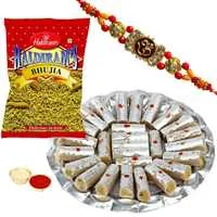 4 Designer Ethnic Rakhi with 500 Gms. Kaju Pista Roll n 200 Gms. Haldirams Bhujia