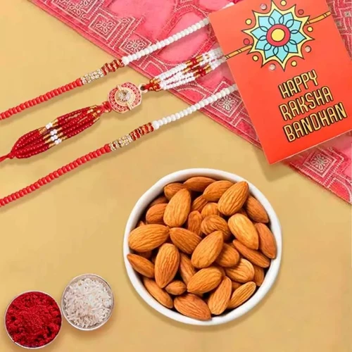 Charming Set of 3 Rakhis with Crunchy Almonds Roli Tika n Card