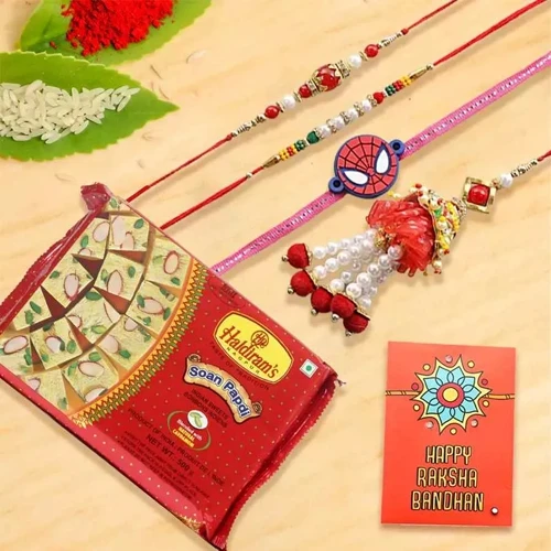 Appealing Family Set Rakhi with Haldiram Soan Papdi