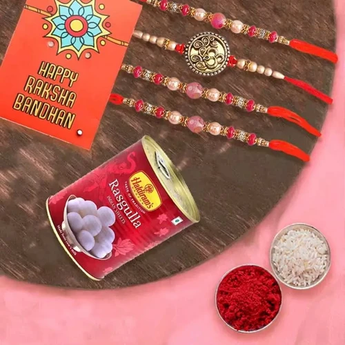 Arresting Set of 4 Rakhi with Haldiram Rasgulla