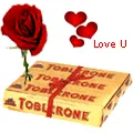 Toblerone Swiss make (400 gms) with One Velvet Exclusive <font color =#FF0000> Dutch Red </font>   Roses 
